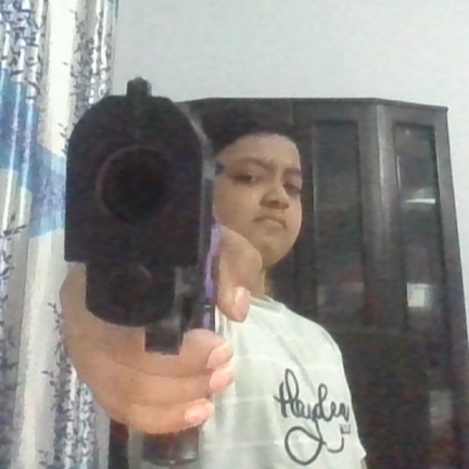 Samin with a TOY GUN